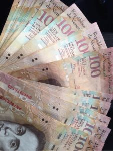 A wad of the banned Bs.F. 100 banknote.
